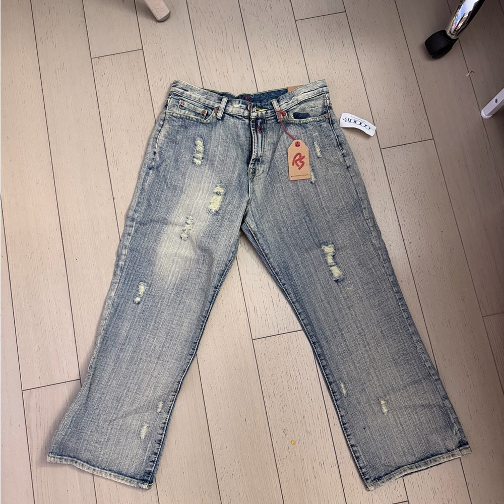 Distressed Light Blue Jeans